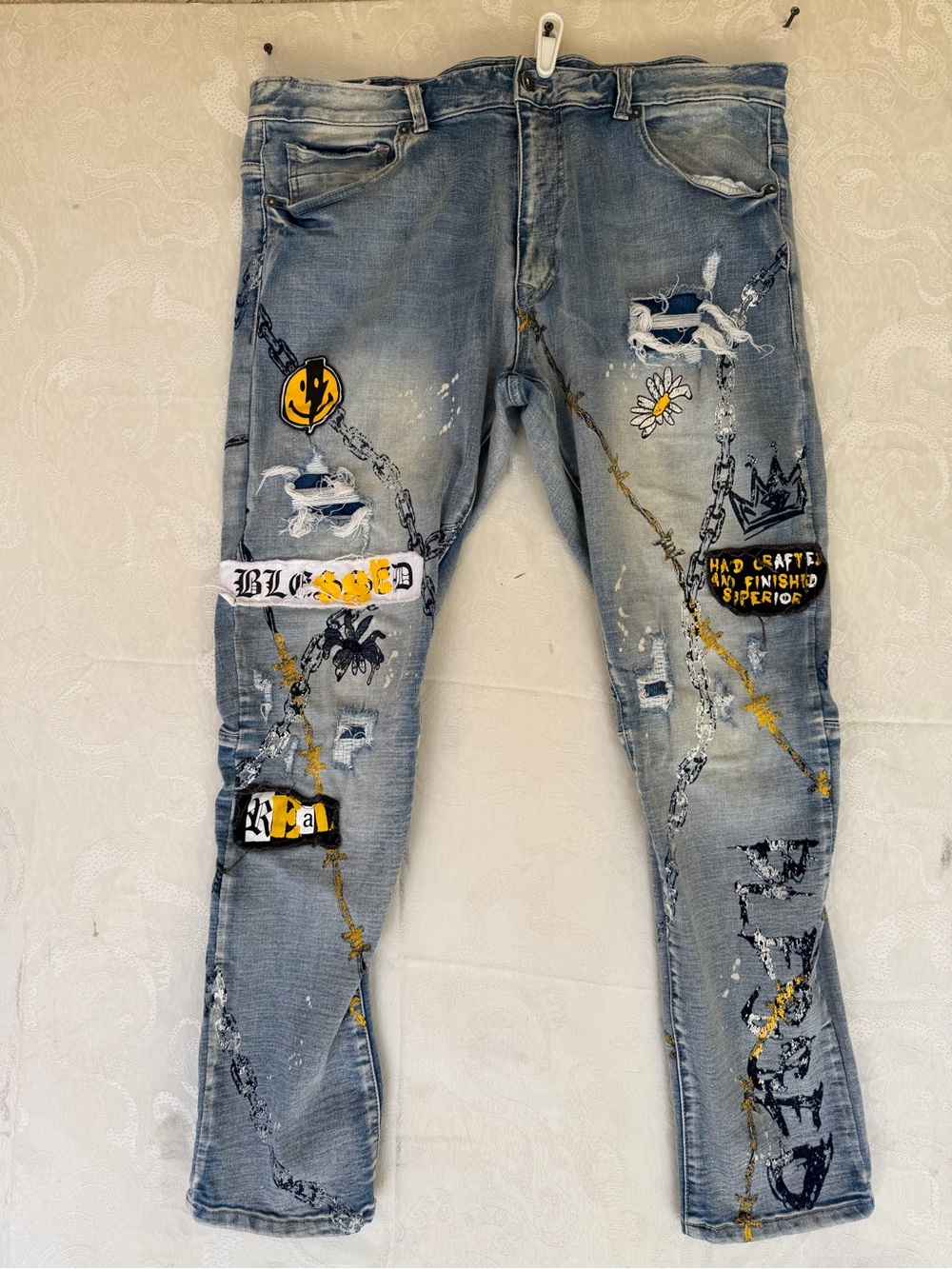 Light Blue Skinny Men's Jeans with Graphic Patchwork and Distressed Details